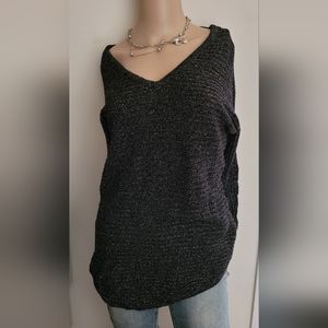 Long sleeve sweater. Like new. Metallic and black. Size XS